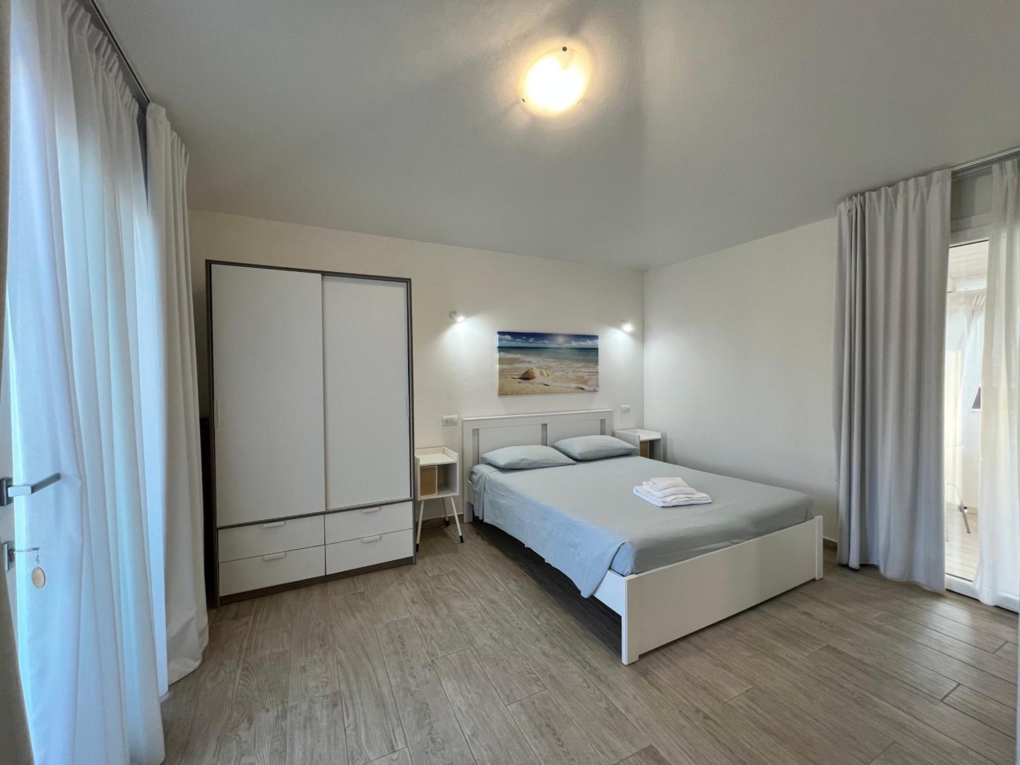 Case Vacanze Bianco Mare Porto Pino Exterior foto