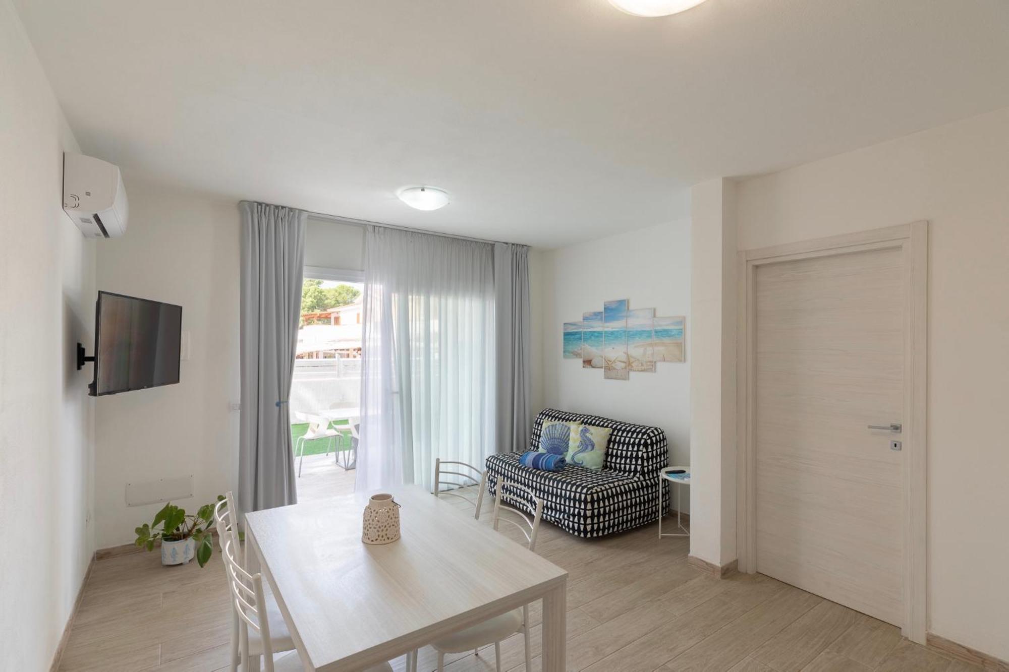 Case Vacanze Bianco Mare Porto Pino Habitación foto