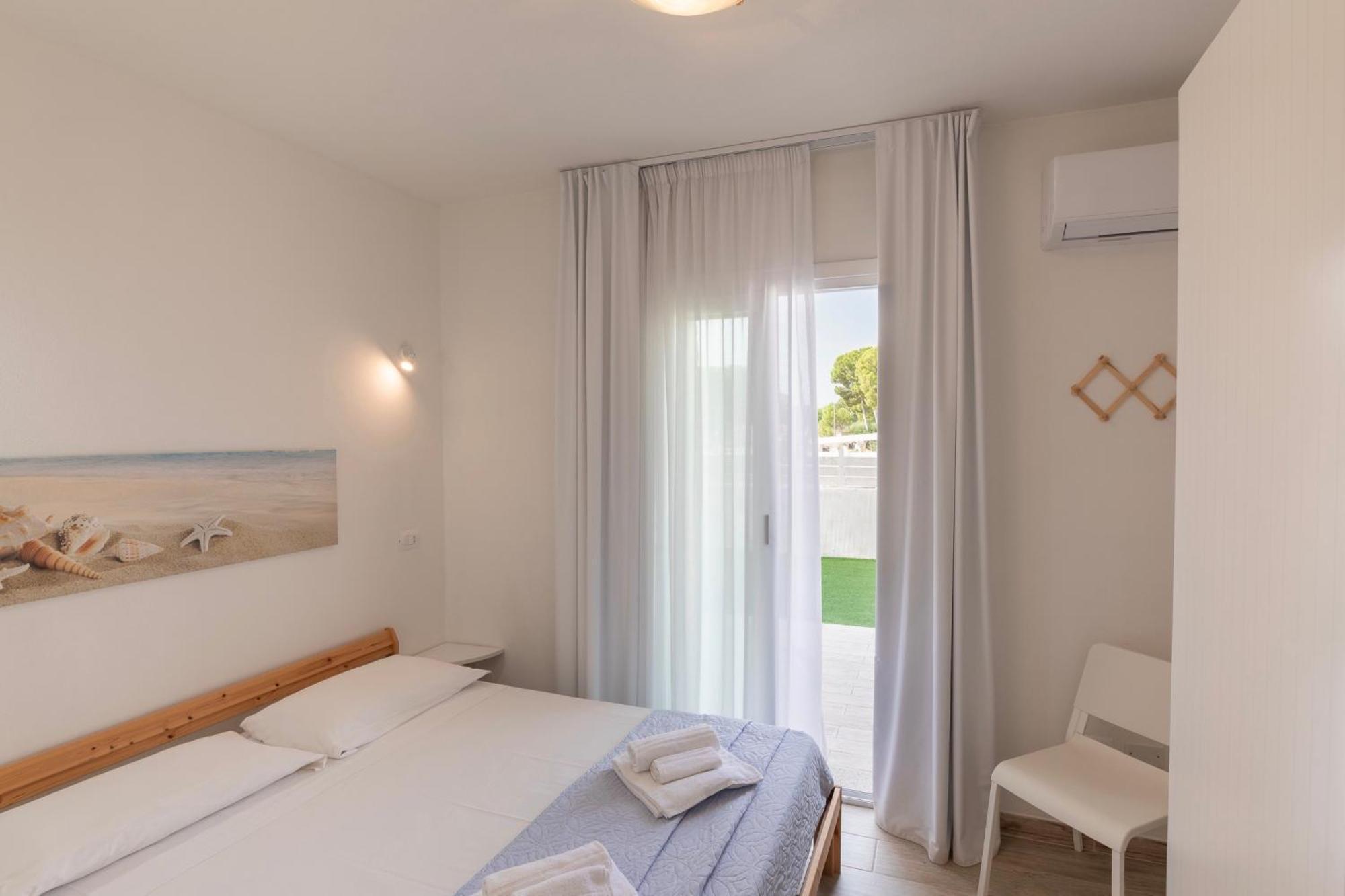 Case Vacanze Bianco Mare Porto Pino Habitación foto