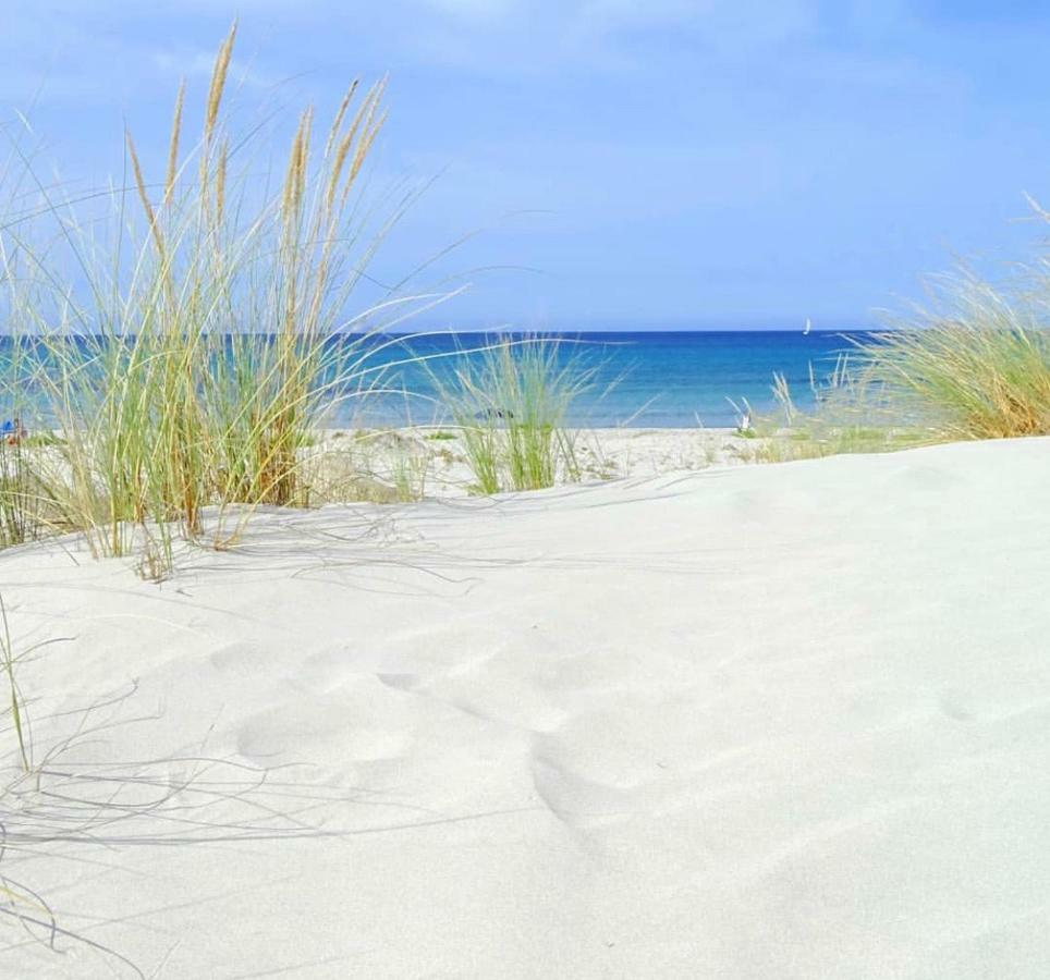 Case Vacanze Bianco Mare Porto Pino Exterior foto